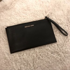 Micheal Kors clutch with wrist band
